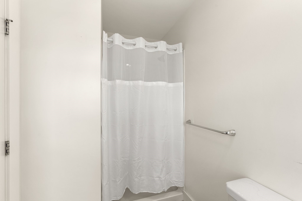 20 Penniman Road, Unit P3 Boston, MA 02134 - Photo 17 of 22 a bathroom with a toilet