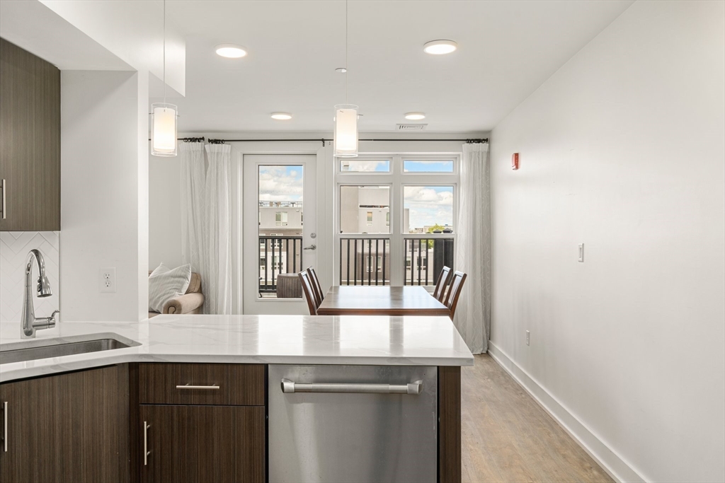20 Penniman Road, Unit P3 Boston, MA 02134 - Photo 2 of 22 a kitchen with a sink and a window
