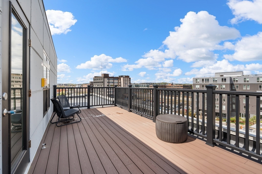 20 Penniman Road, Unit P3 Boston, MA 02134 - Photo 21 of 22 a view of balcony with wooden floor