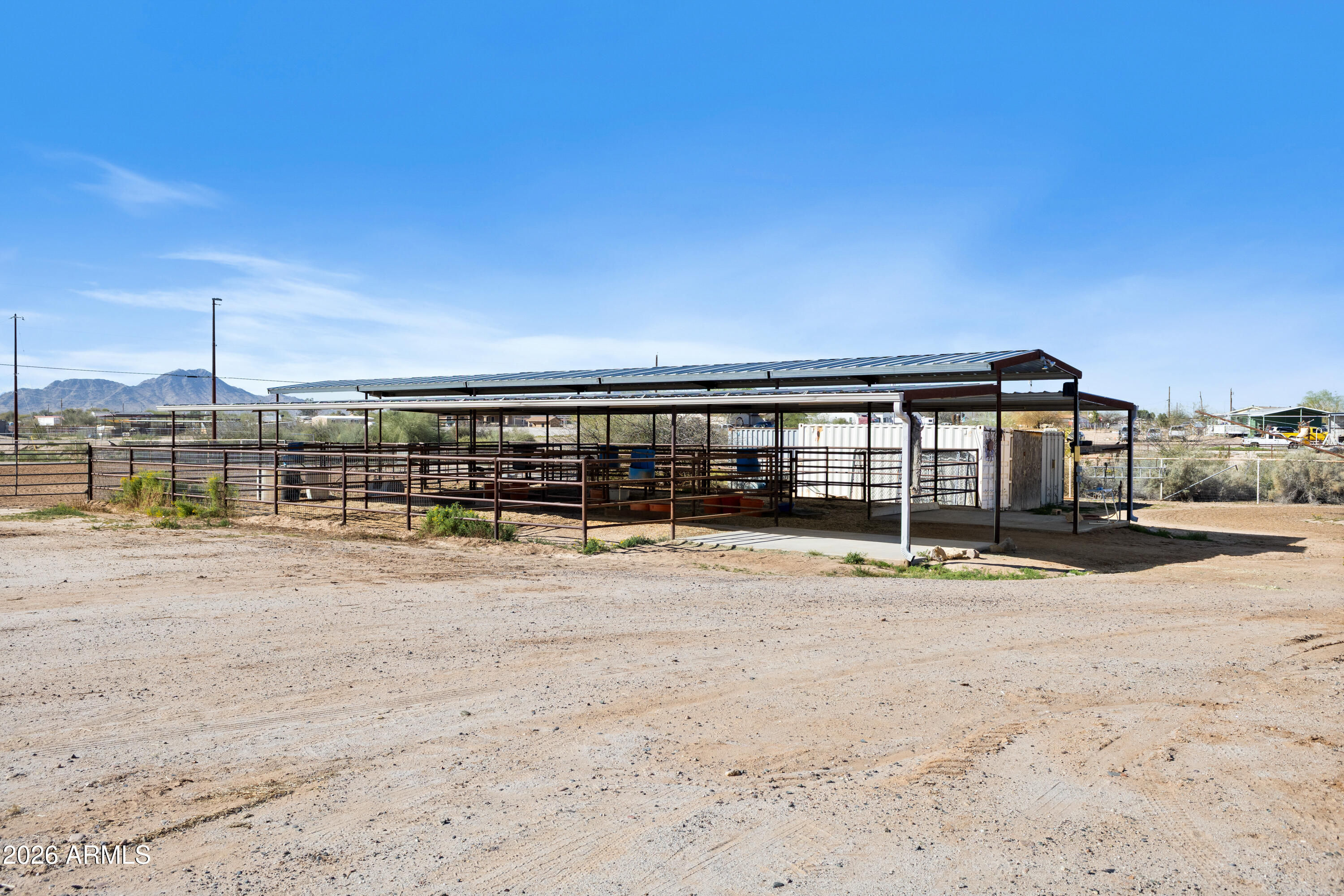 20526 West Carver Road Buckeye, AZ 85326 - Photo 31 of 43 a view of a swimming pool with a yard