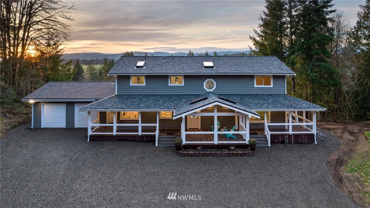 14126 Littlerock Road Southwest Rochester, WA 98579 - Photo 1 of 40 a view of house with a yard