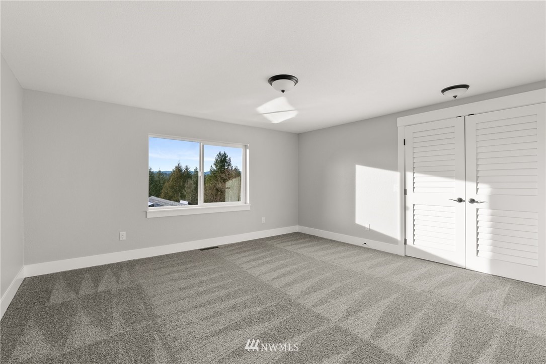 14126 Littlerock Road Southwest Rochester, WA 98579 - Photo 25 of 40 a view of a room with a large window