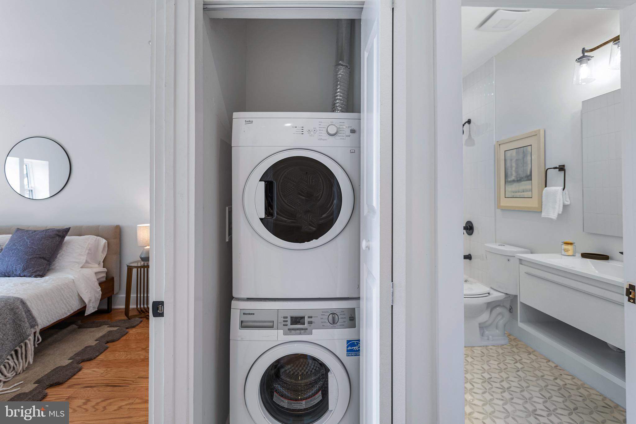 1118 Neal Street Northeast, Unit 2 Washington, DC 20002 - Photo 10 of 25 a view of a bedroom with washer and dryer