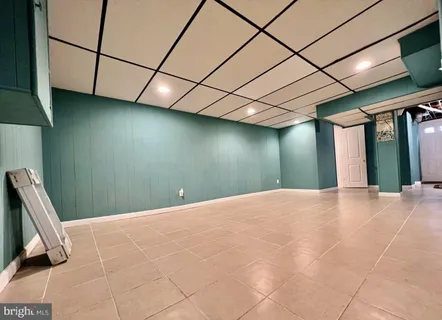 a view of a livingroom with a staircase