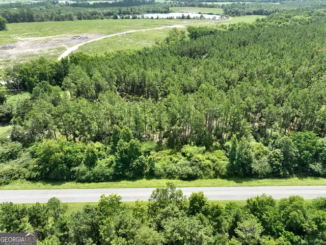 a view of a yard with an outdoor space