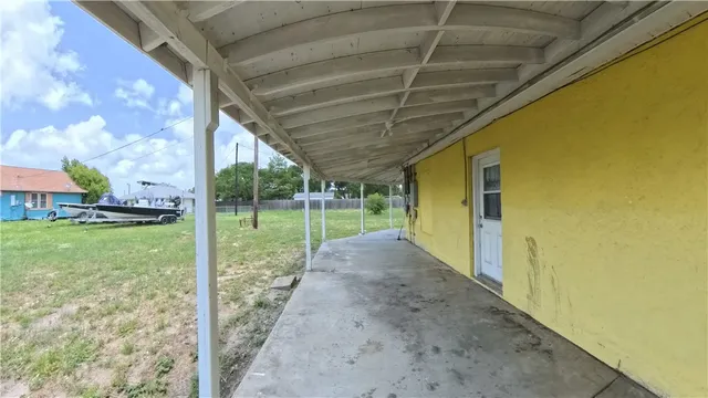 a view of a porch with a backyard