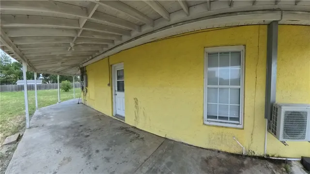 a view of a backyard of a house