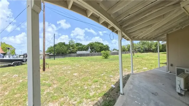 a view of a room with yard from a ceiling window