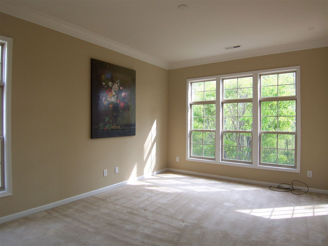 6157 Blakeman Lane Raleigh, NC 27617 - Photo 14 of 25 Rare find: 1st floor master bedroom with access to covered back porch! Great place for morning coffee and newspaper! Enjoy Master bedroom