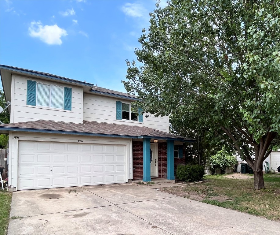 116 Orange Tree Lane Georgetown, TX 78626 - Photo 1 of 1 a front view of a house with a tree