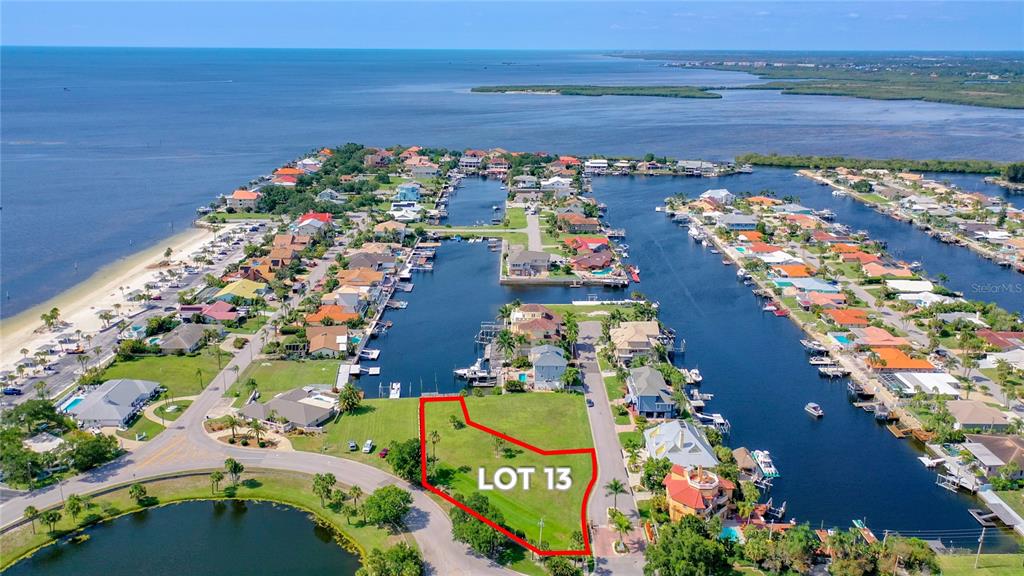 13 Captains Court New Port Richey, FL 34652 - Photo 2 of 35 view of a lake