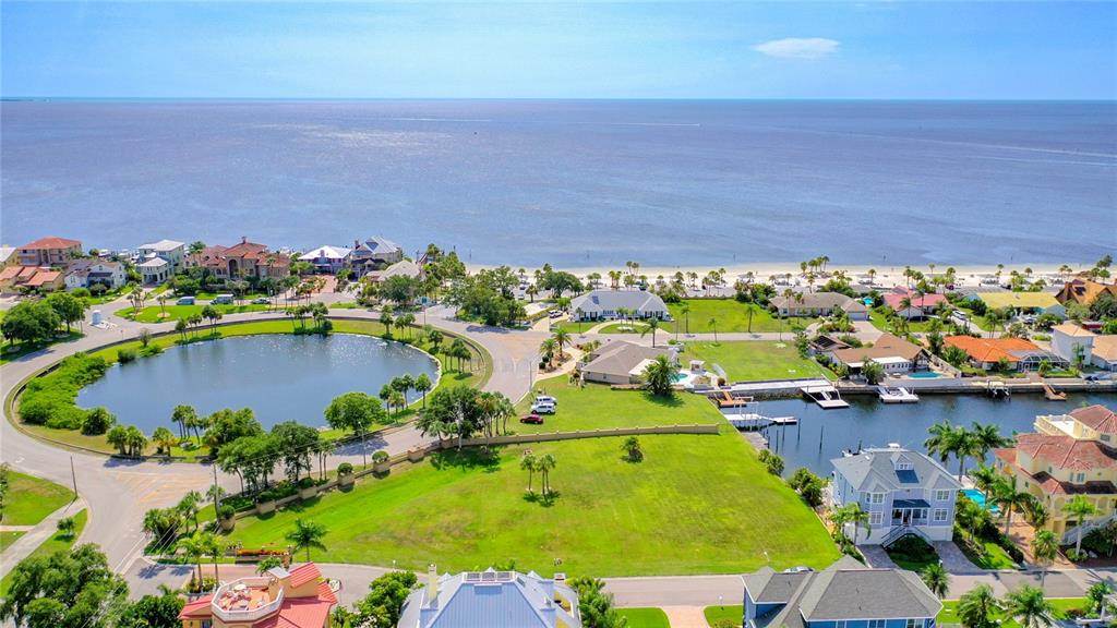 13 Captains Court New Port Richey, FL 34652 - Photo 3 of 35 an aerial view of a house a yard and lots of trees