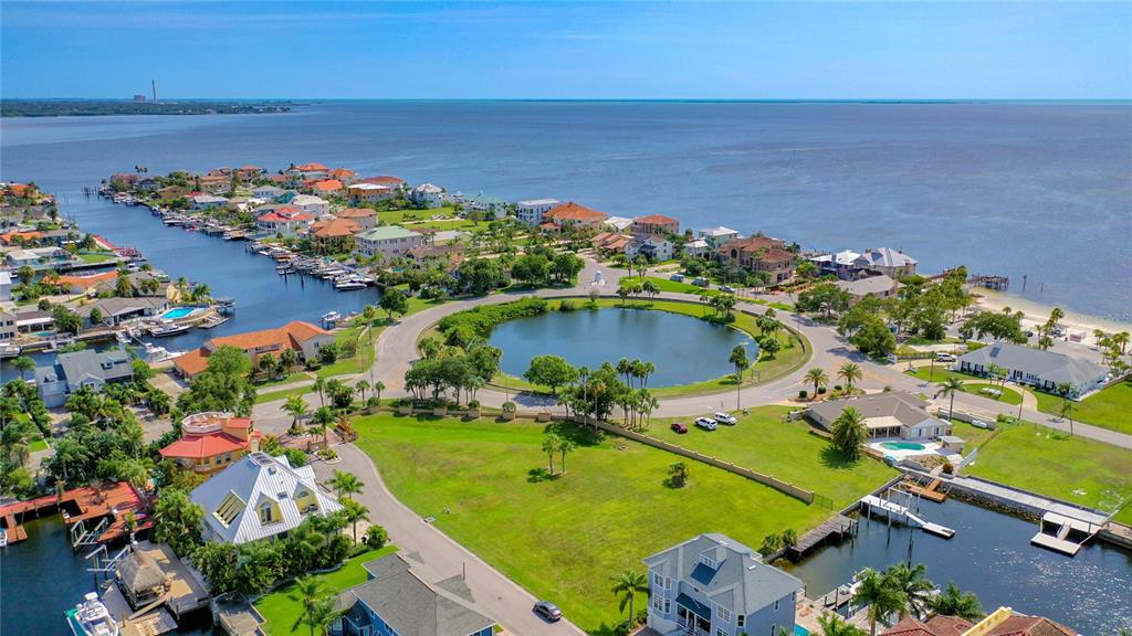 13 Captains Court New Port Richey, FL 34652 - Photo 9 of 35 an aerial view of a pool patio swimming pool and outdoor seating