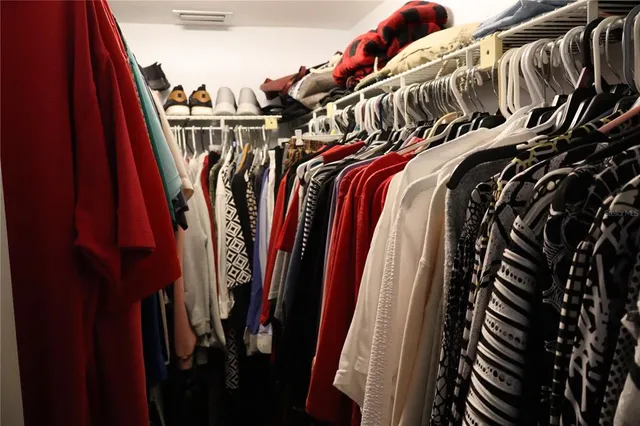 a view of a chairs and table in the balcony