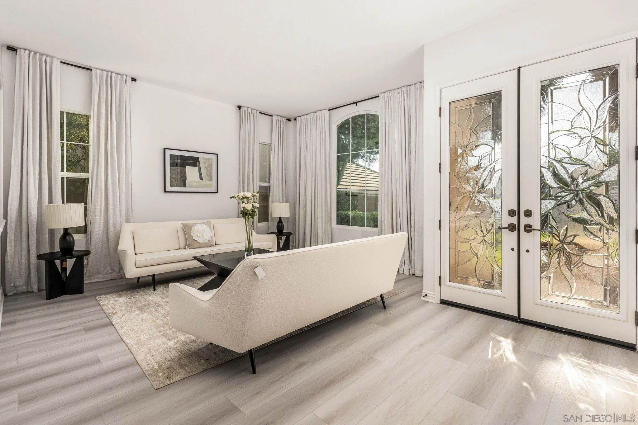 38944 Cherry Point Lane Murrieta, CA 92563 - Photo 3 of 40 a living room with furniture and large windows