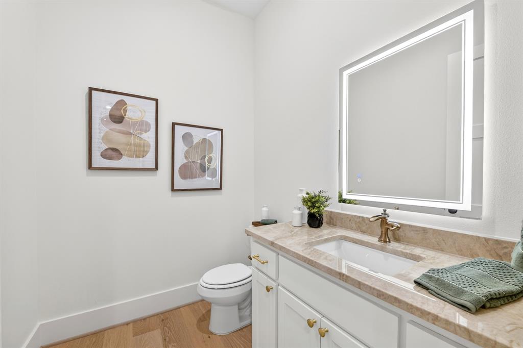 10373 Bobbie Lane Pilot Point, TX 76258 - Photo 8 of 40 Good sized half bath for guests located off the front of the home