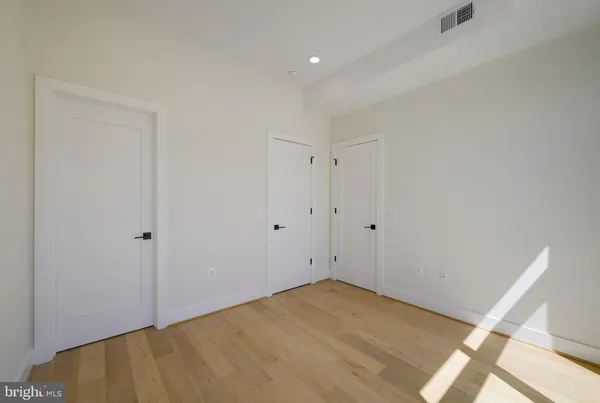 a front view of a building with multiple windows