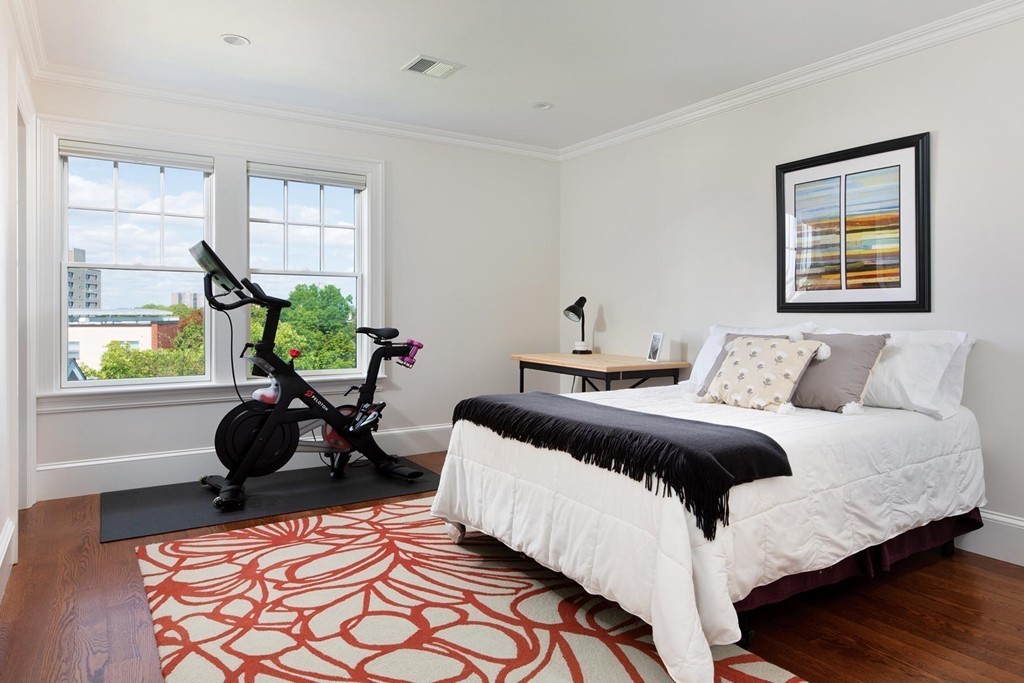 27 Summit Avenue, Unit 27 Brookline, MA 02446 - Photo 11 of 21 a bedroom with double bed and a window