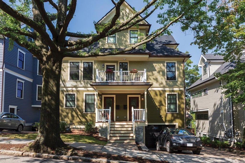 27 Summit Avenue, Unit 27 Brookline, MA 02446 - Photo 21 of 21 a front view of a residential apartment building with a yard