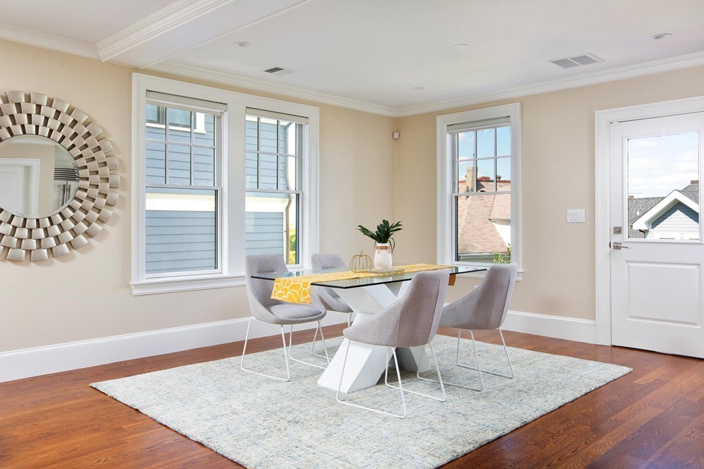 27 Summit Avenue, Unit 27 Brookline, MA 02446 - Photo 6 of 21 a view of a dining room with furniture and wooden floor