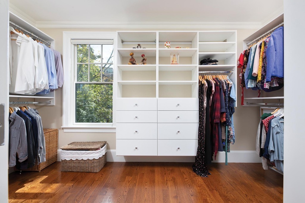 27 Summit Avenue, Unit 27 Brookline, MA 02446 - Photo 9 of 21 a view of walk in closet with clothes and shoes