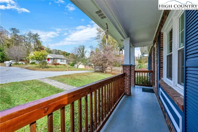 a view of a porch with a yard