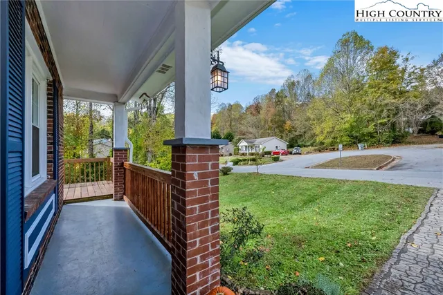 a view of a patio in a backyard