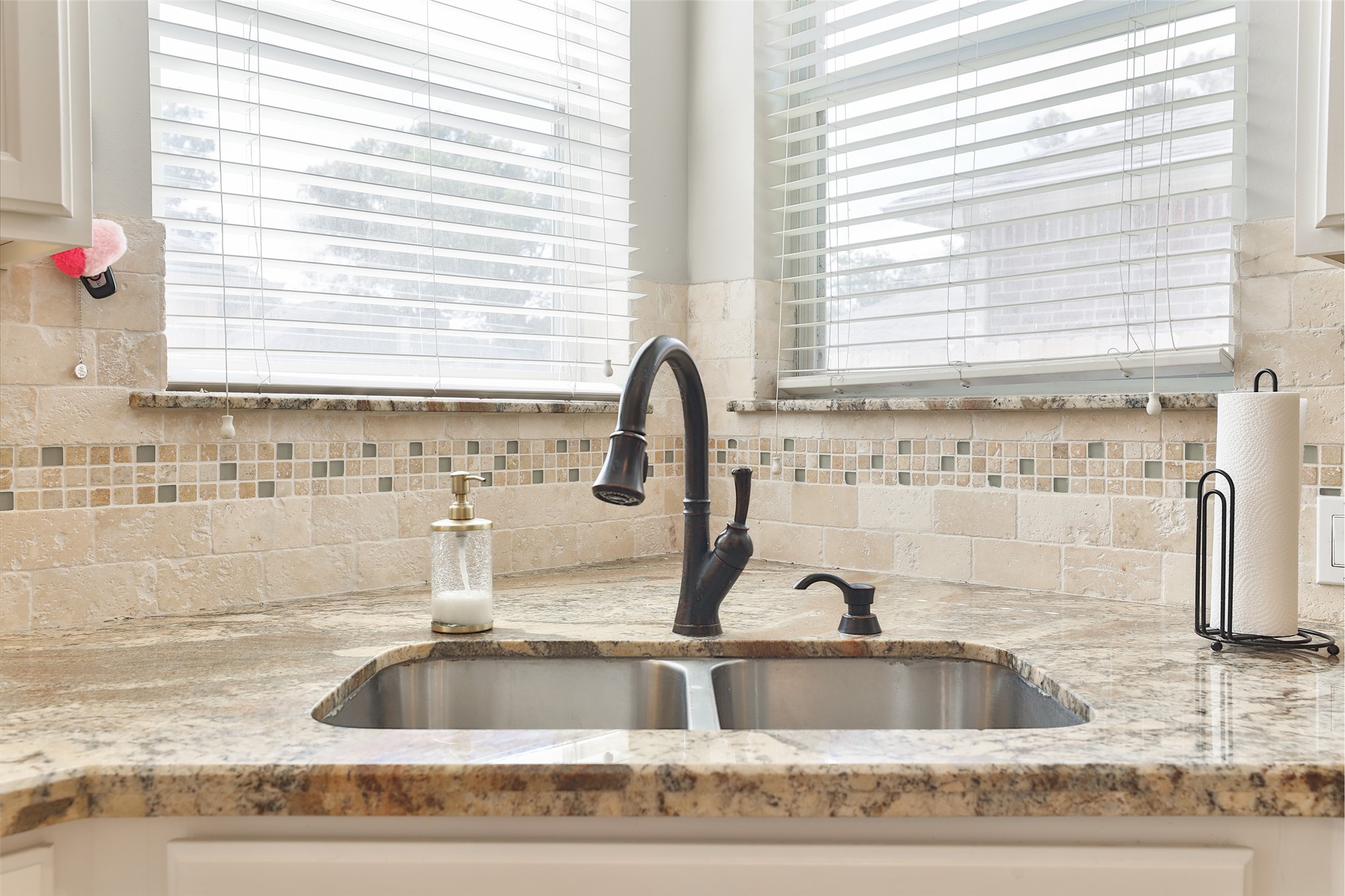 10514 Spice Ridge Row Missouri City, TX 77459 - Photo 17 of 43 a close view of sink and a window