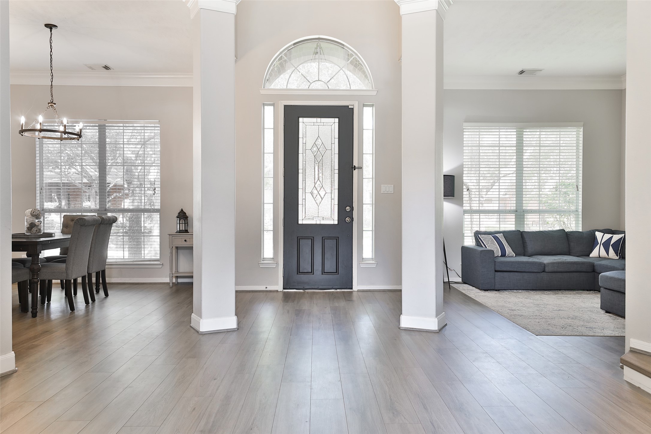 10514 Spice Ridge Row Missouri City, TX 77459 - Photo 2 of 43 a living room with furniture and a large window