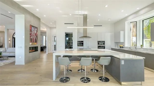 a bathroom with a shower and a glass door