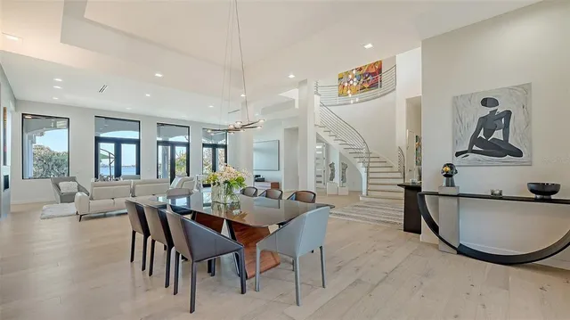 a living room with furniture or couch and a large window