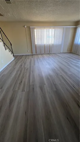 a view of wooden floor and staircase