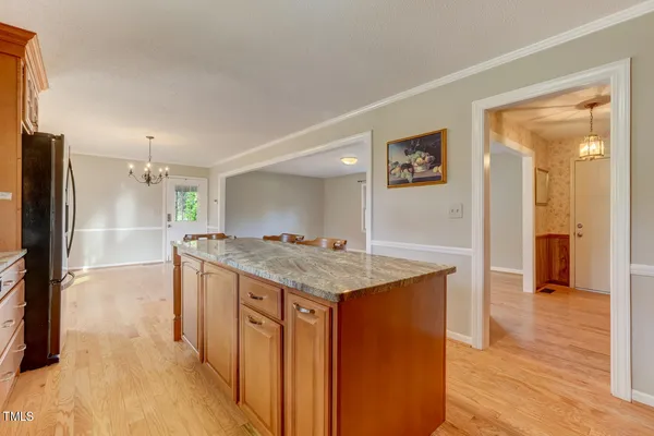 a kitchen with a counter top space and a sink