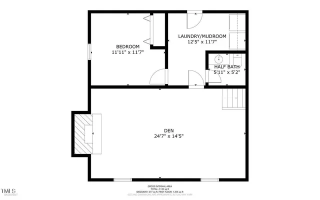 a picture of a bench in front of a wall