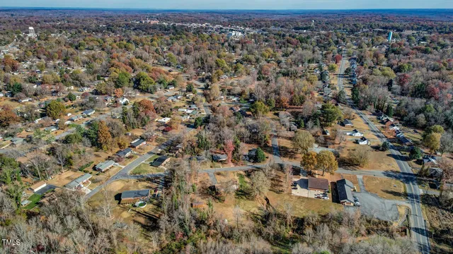 an aerial view of residential house with parking space