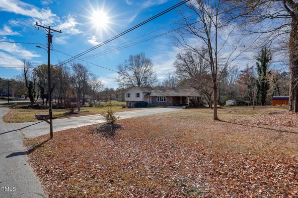 a park with lots of traffic signal lights