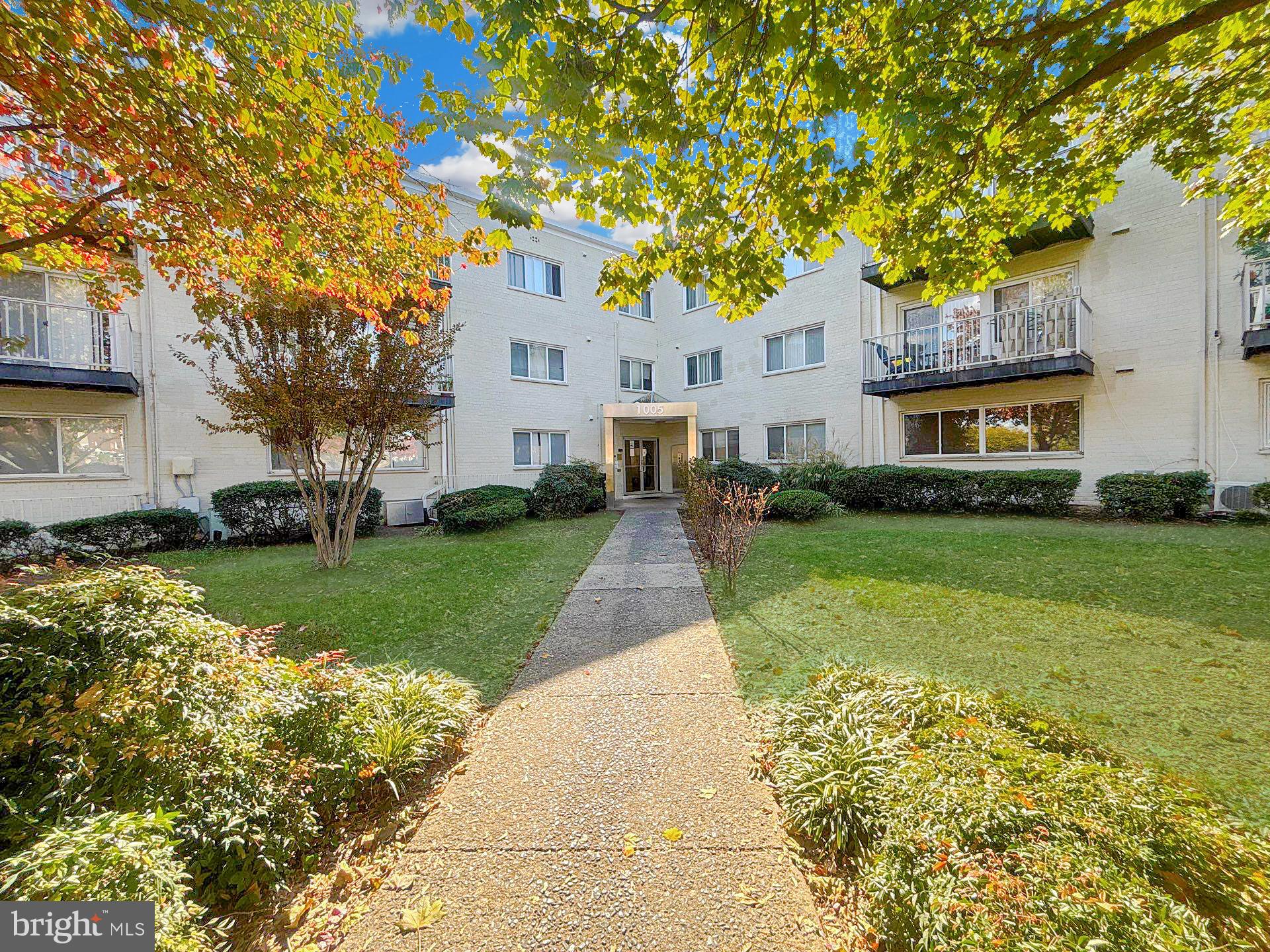 1005 Chillum Road, Unit 317 Hyattsville, MD 20782 - Photo 1 of 9 a front view of a house with garden