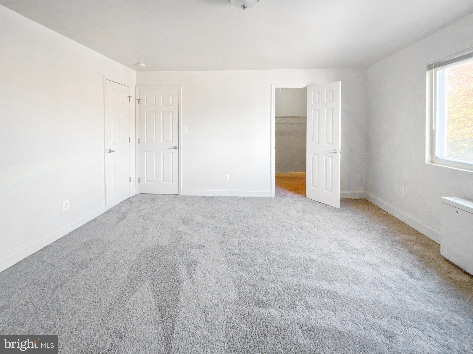 1005 Chillum Road, Unit 317 Hyattsville, MD 20782 - Photo 6 of 9 a view of an empty room with a window