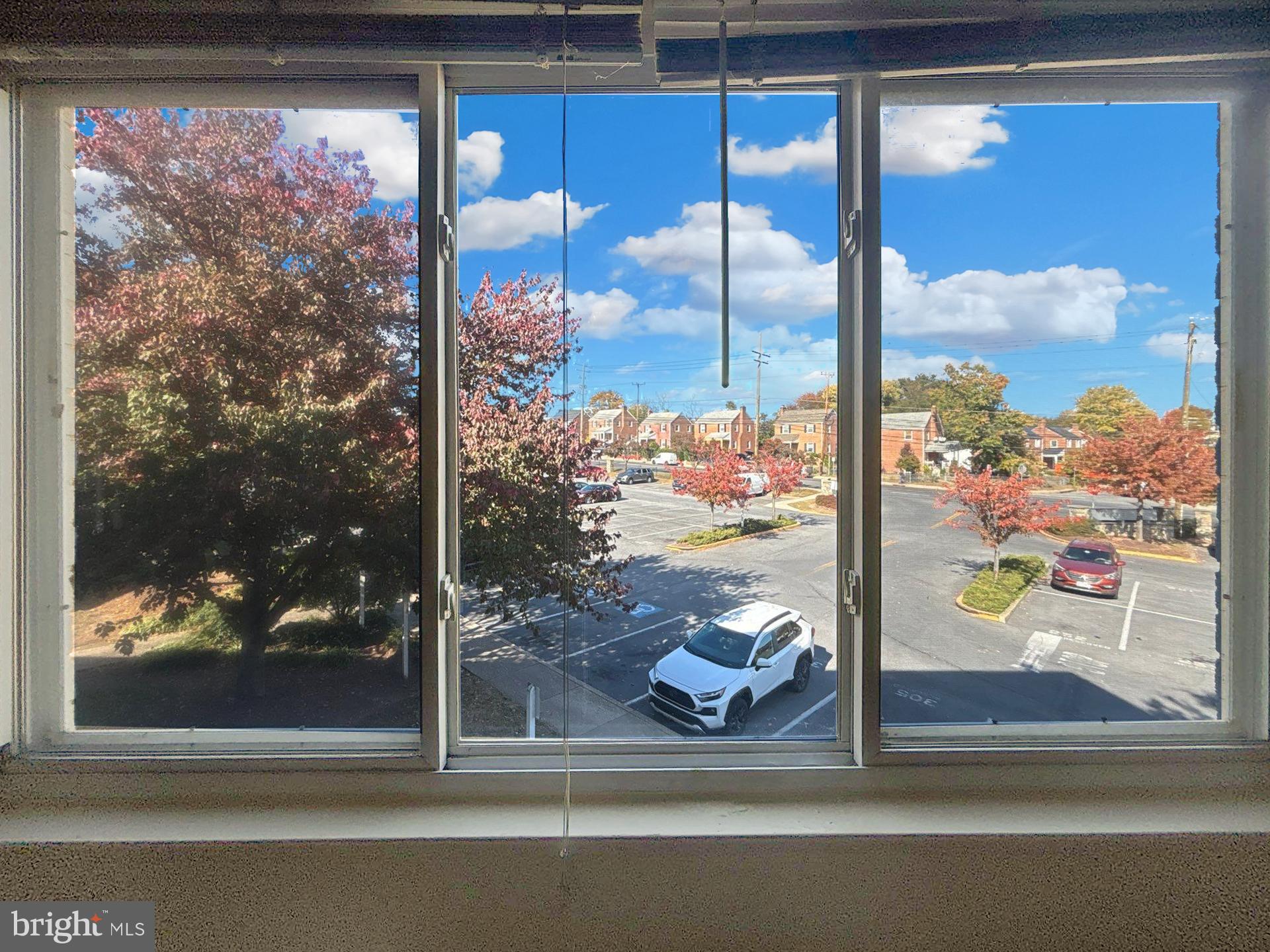1005 Chillum Road, Unit 317 Hyattsville, MD 20782 - Photo 8 of 9 a window that has a glass door