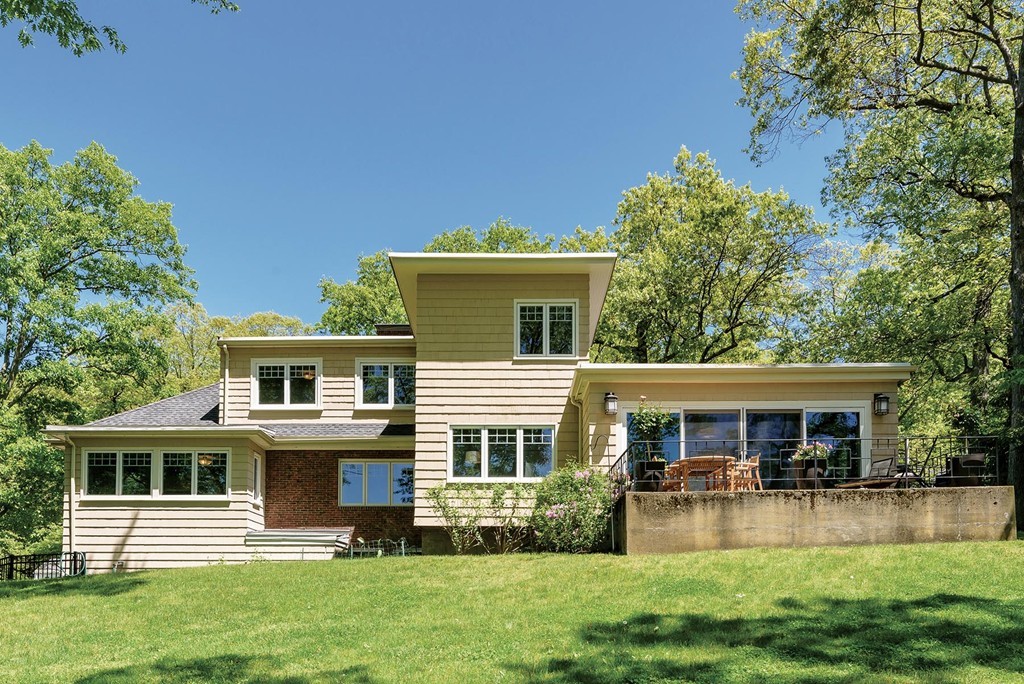 87 Beverly Road Brookline, MA 02467 - Photo 16 of 16 a front view of house with yard and green space