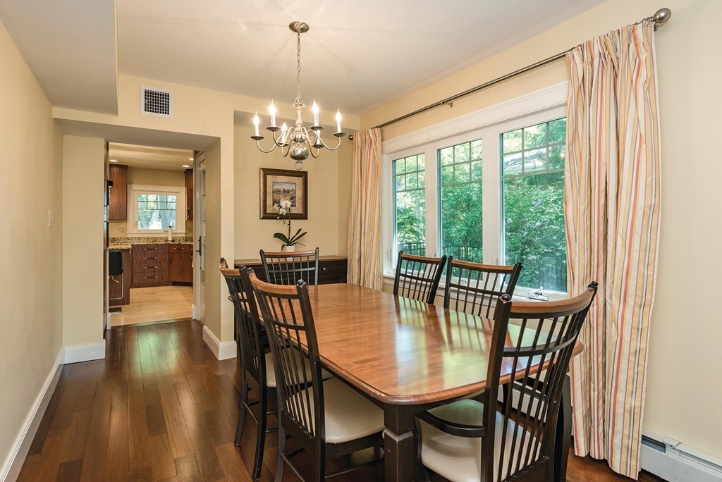87 Beverly Road Brookline, MA 02467 - Photo 6 of 16 a view of a dining room with furniture window and wooden floor