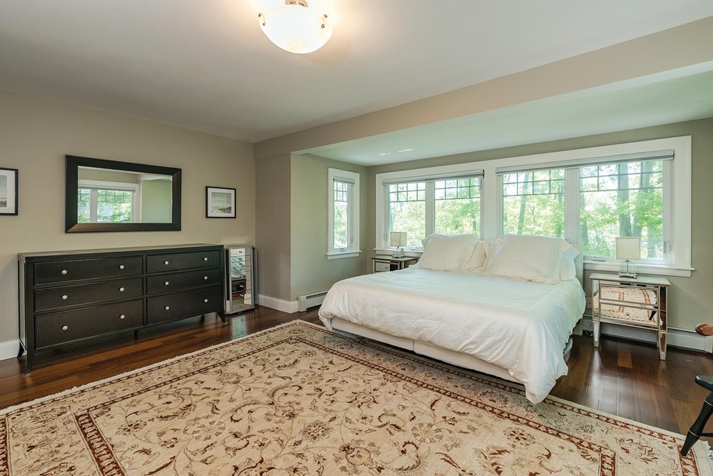 87 Beverly Road Brookline, MA 02467 - Photo 8 of 16 a bedroom with a bed and a dresser