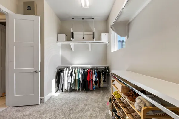 a bathroom with a sink a shower and a mirror
