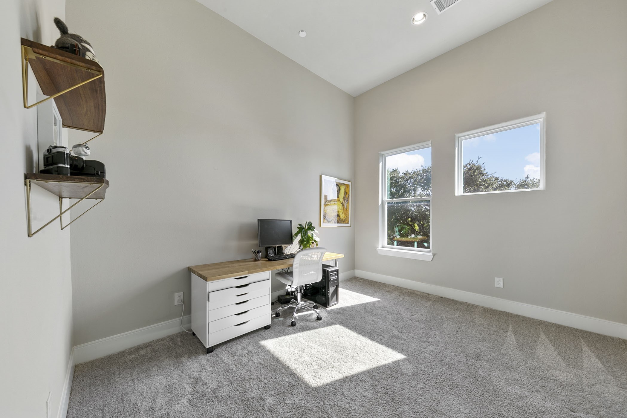 2412 Canal Street, Unit J Houston, TX 77003 - Photo 17 of 19 a room with furniture and a window