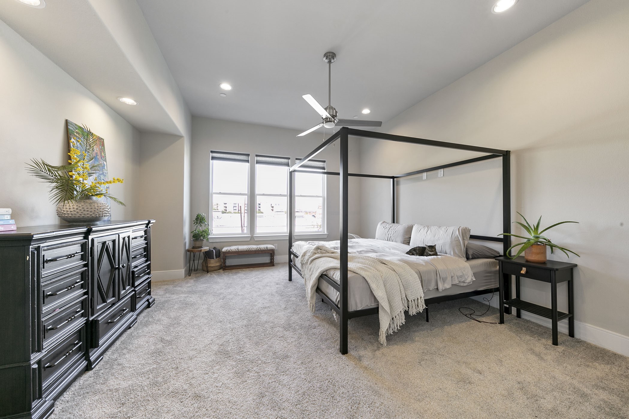 2412 Canal Street, Unit J Houston, TX 77003 - Photo 9 of 19 a bed room with bed and a window