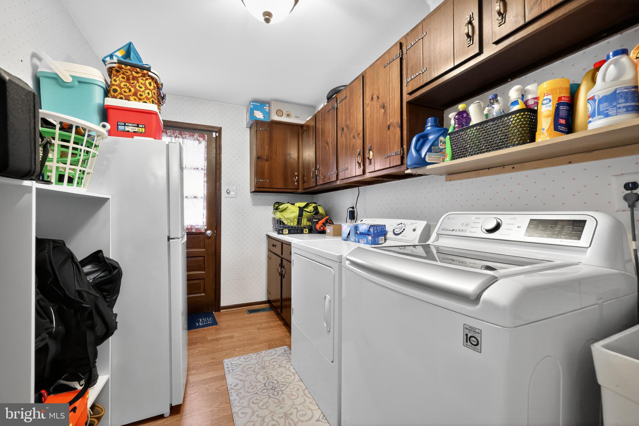 665 Chatham Road Somerdale, NJ 08083 - Photo 16 of 36 a utility room with fridge dryer and washer
