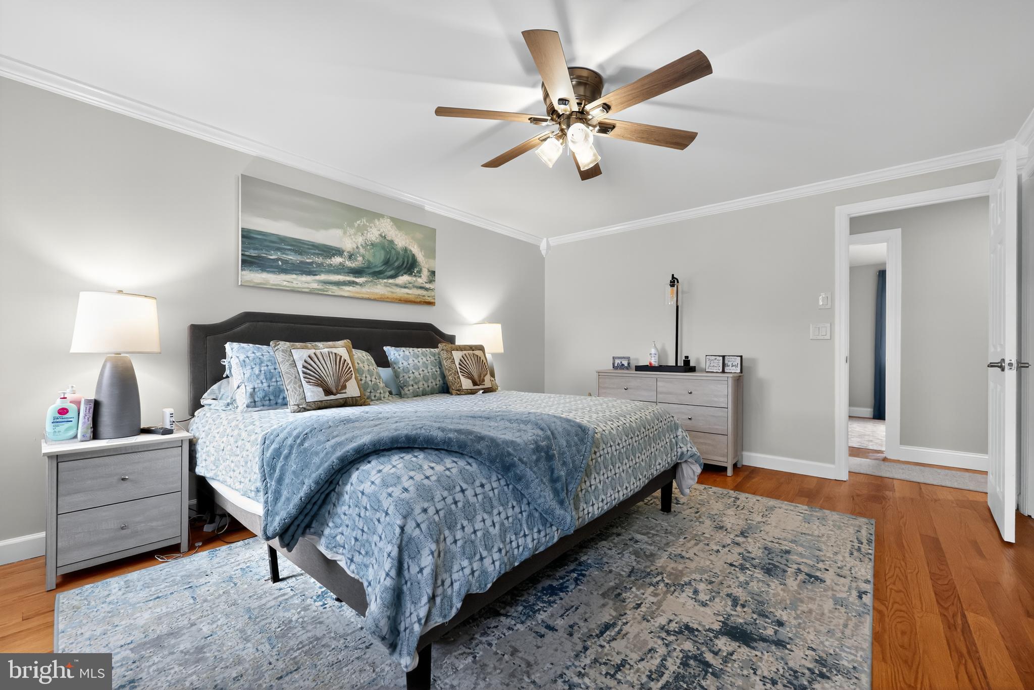 665 Chatham Road Somerdale, NJ 08083 - Photo 20 of 36 a bedroom with a bed and a chandelier