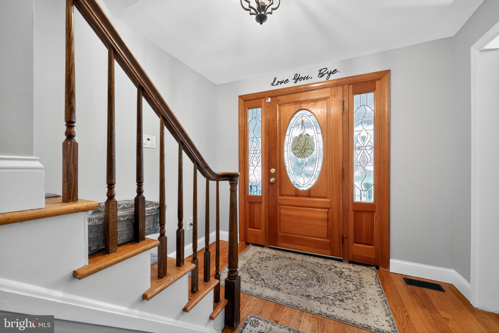 665 Chatham Road Somerdale, NJ 08083 - Photo 2 of 36 a view of a hallway with wooden floor and entryway