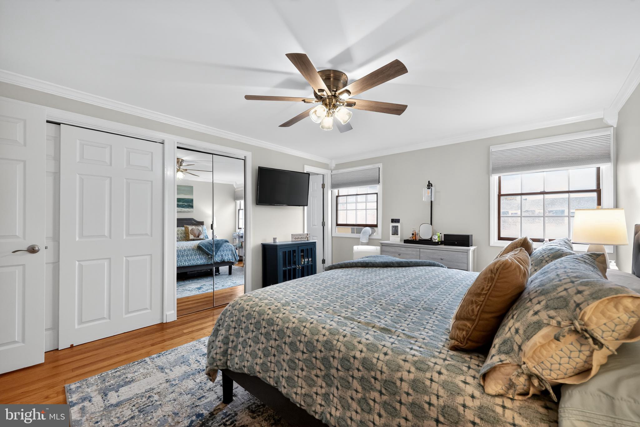 665 Chatham Road Somerdale, NJ 08083 - Photo 21 of 36 a spacious bedroom with a bed and a chandelier