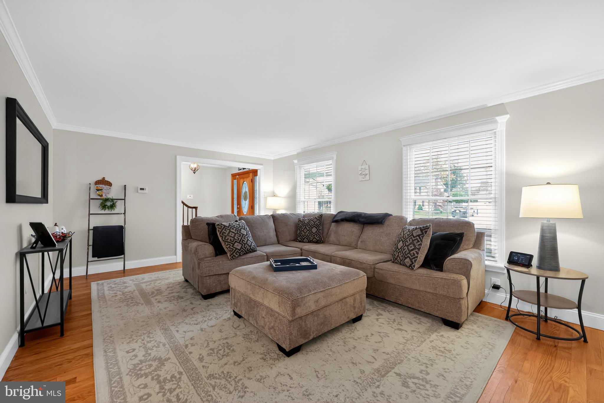 665 Chatham Road Somerdale, NJ 08083 - Photo 3 of 36 a living room with furniture and a wooden floor